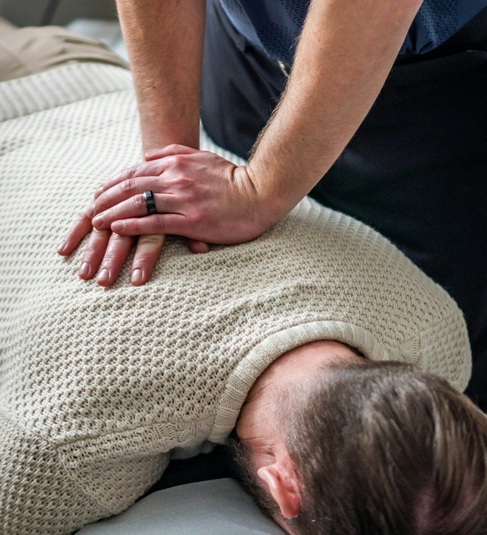 Seo Chiropractors - Doc-Rep A chiropractor’s hands during a back adjustment